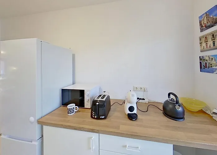 In Hanglage Mit Garten Und Balkon Appartement