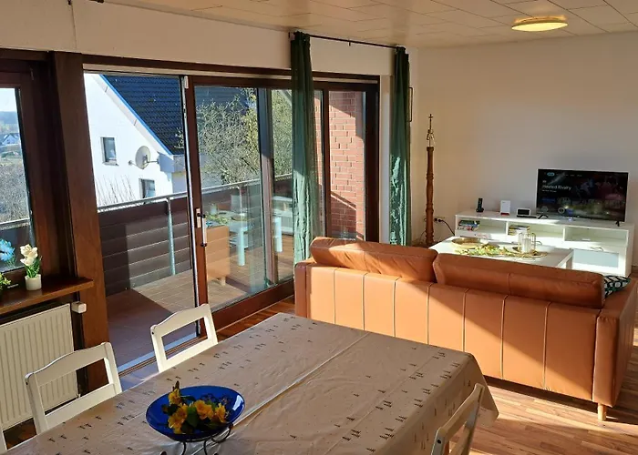 Appartement In Hanglage Mit Garten Und Balkon