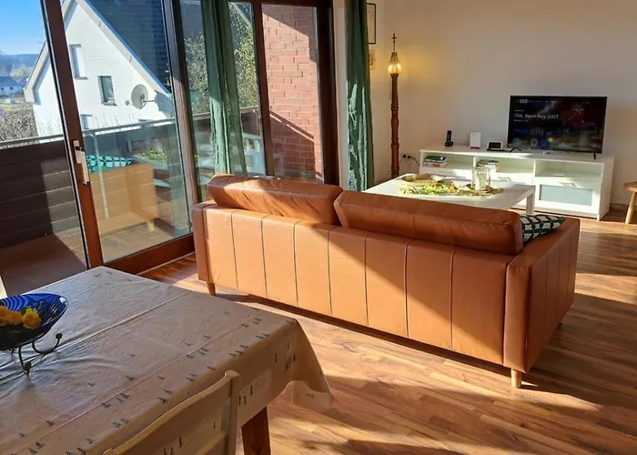Apartment In Hanglage Mit Garten Und Balkon